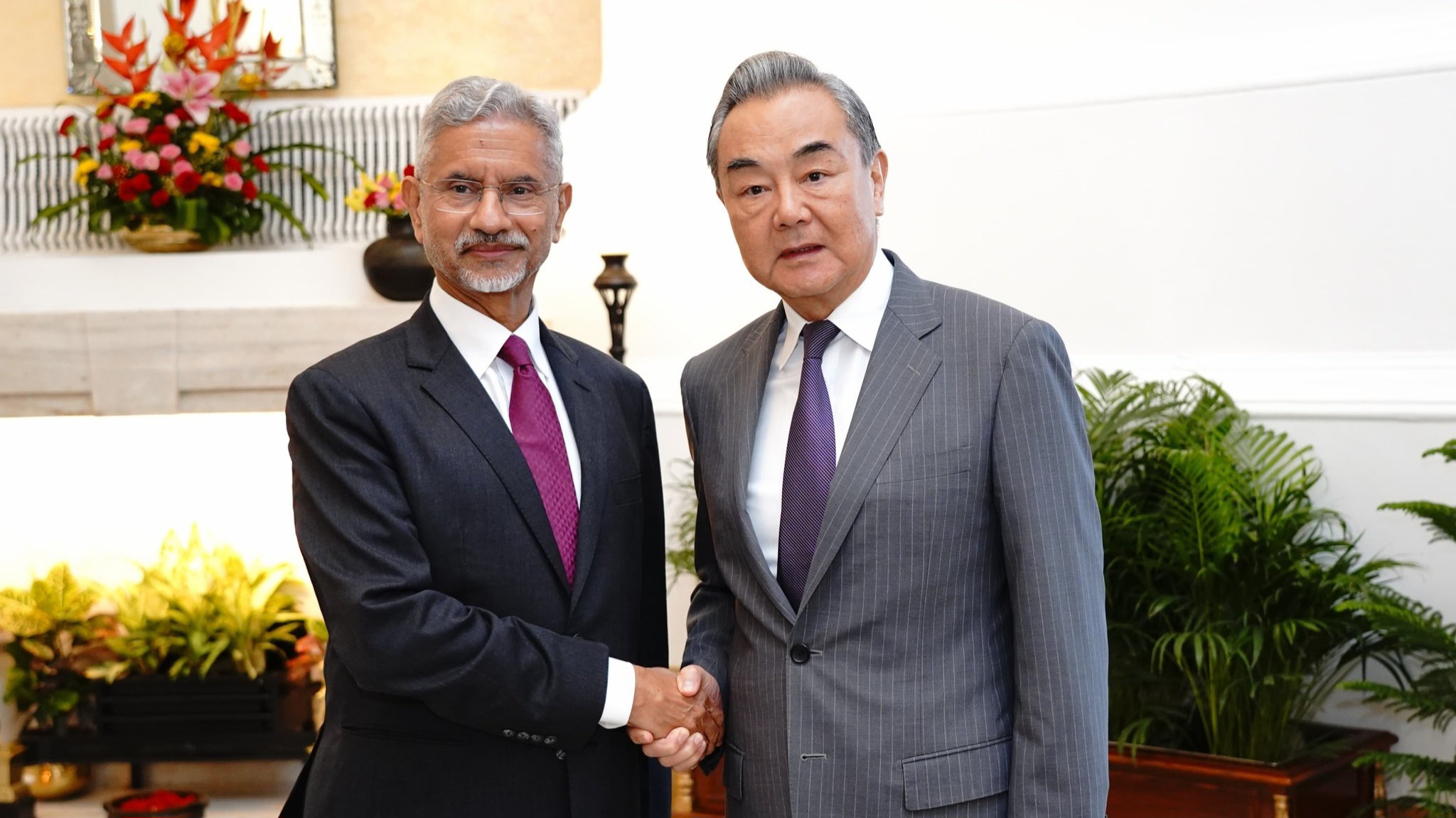 Indian foreign minister S. Jaishankar (left)shakes hand with his Chinese counterpart Wang Yi(right) image credits: X/ @drsjaishankar Indian foreign minister S. Jaishankar (left)shakes hand with his Chinese counterpart Wang Yi(right) image credits: X/ @drsjaishankar