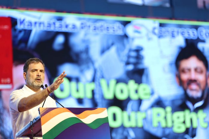 Rahul Gandhi addressing the crowd during the ‘Vote Adhikar Rally’ in Bengaluru, highlighting concerns over alleged vote irregularities | PMN Patralok