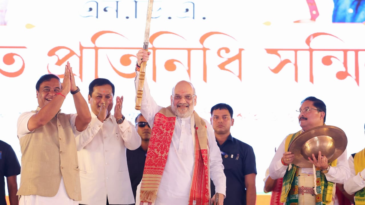 Union Home Minister Amit Shah, flanked by Assam Chief Minister Himanta Biswa Sarma and Union Minister Sarbananda Sonowal, during the NDA Panchayat Pratinidhi Sammelan in Guwahati. image credits: x/ @amitshah Union Home Minister Amit Shah, flanked by Assam Chief Minister Himanta Biswa Sarma and Union Minister Sarbananda Sonowal, during the NDA Panchayat Pratinidhi Sammelan in Guwahati. image credits: x/ @amitshah
