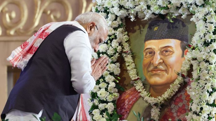 prime minister of india narendra modi paying tribute to Bhupen Hazarika Singer and former Member of the Assam Legislative Assembly during his assam visit